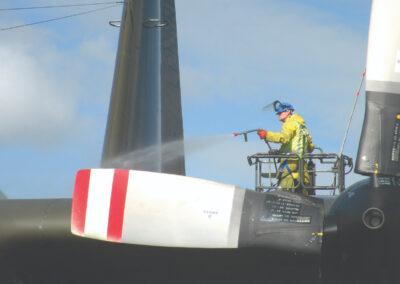Operator using aircraft rinse cart
