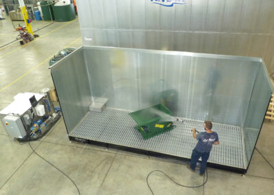 Equipment getting washed in the above ground wash racks
