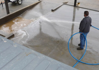 In-ground wash system pad drain