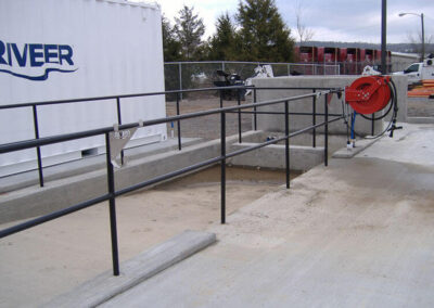 In-ground wash system pad drainage canal