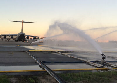 Back angle of tactical rinse system water sprayers