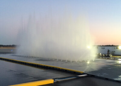 Tactical rinse system water spray