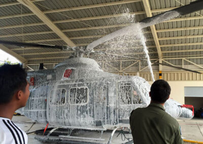 Person using the in-hangar wingman on helicopter