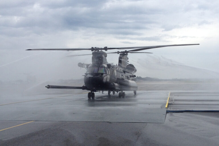 Chinook Helicopter being sprayed with water by TRS