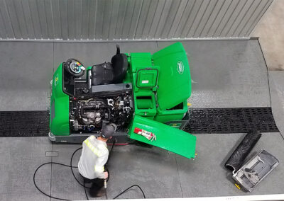 Person using Compact Above Ground Wash Rack for Rental Equipment Washing Top View