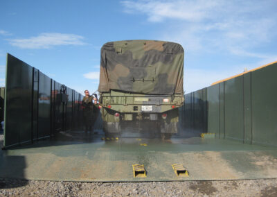 Person washing Military Truck In VWS